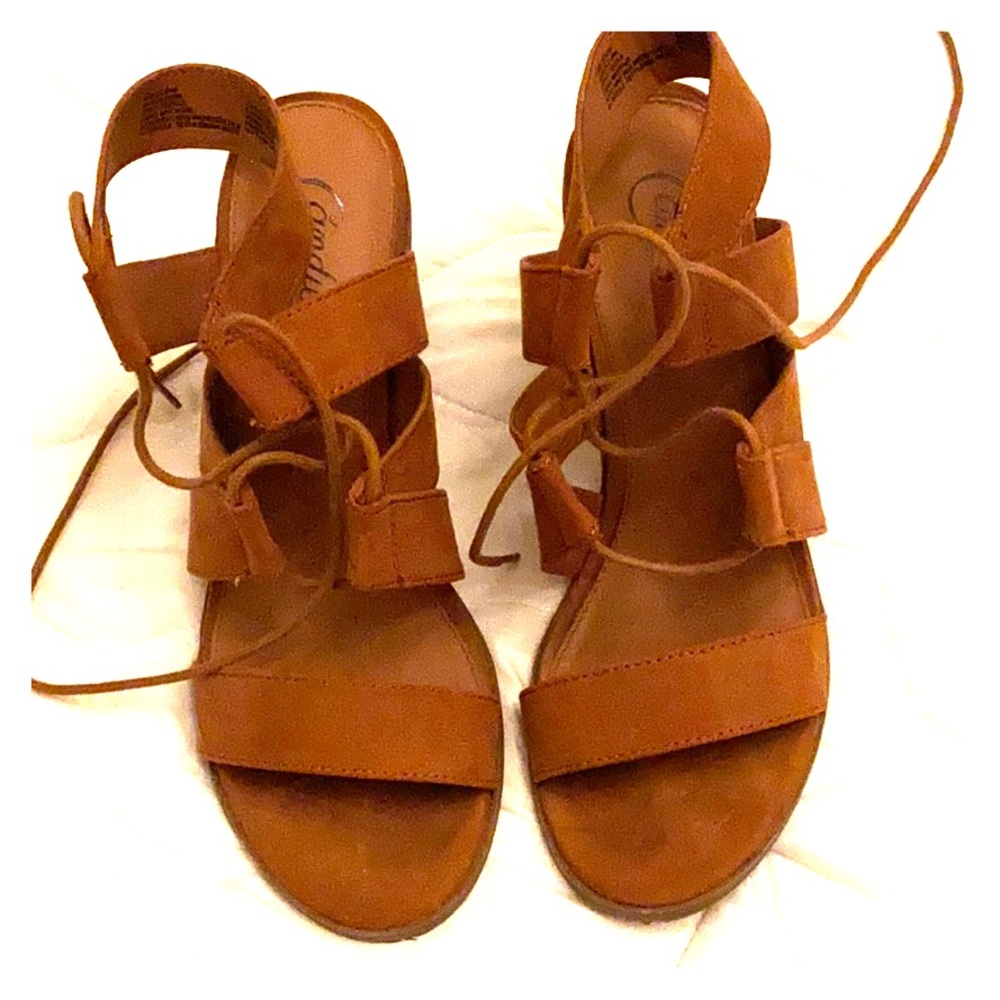 Candie’s Brown open toe tie up heels.